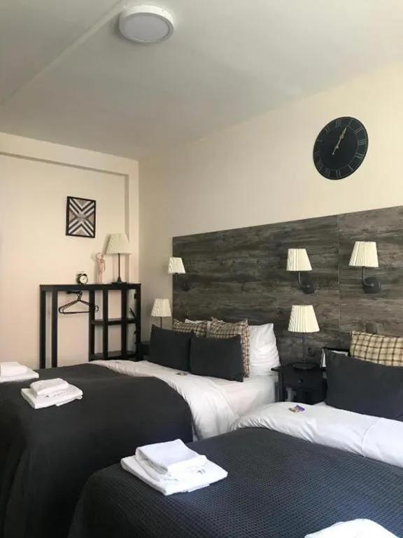 Quadruple Room with Shared Bathroom
